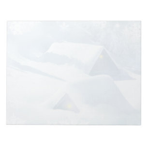 Snow topped roof in a forest notepad