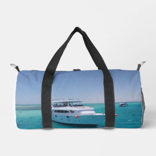 Snow-white yacht near the White Island in Red Sea Duffle Bag