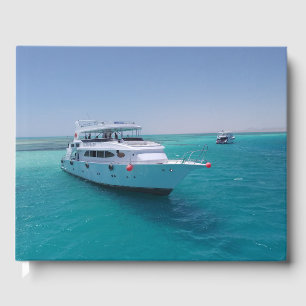 Snow-white yacht  near the White Island in Red Sea Guest Book