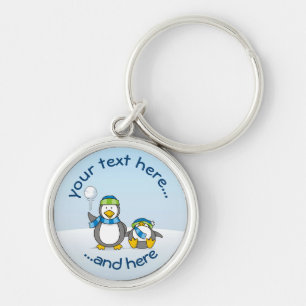 Snowballing penguins key ring