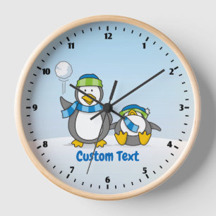 Snowballing penguins wall clock