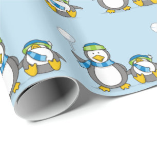 Snowballing penguins wrapping paper