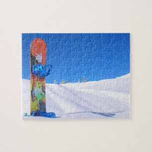 Snowboard in Snow on Bluebird Day Jigsaw Puzzle