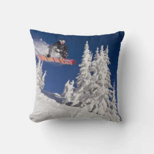Snowboarding action at Whitefish Mountain Resort Cushion