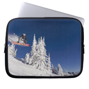 Snowboarding action at Whitefish Mountain Resort Laptop Sleeve