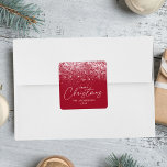 Snowdrift Cranberry Christmas Square Sticker<br><div class="desc">Modern Christmas stickers featuring white snow flurries at the top of the design with a cranberry-coloured background. "Merry Christmas" is displayed in a trendy white calligraphy script with your family name and the year shown below in white lettering. Use the festive holiday stickers to seal Christmas presents, favour bags, and...</div>