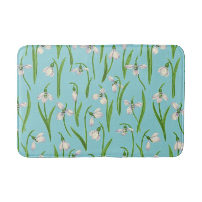Snowdrops on pool blue bath mat (Front)