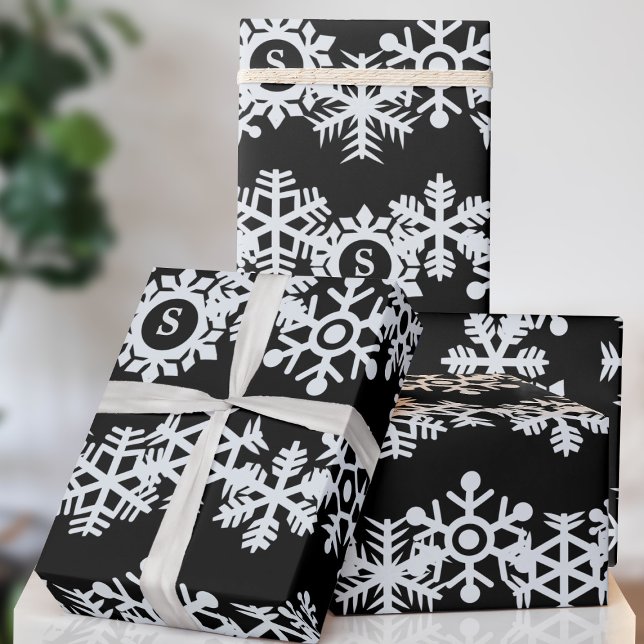 Snowflake Monogram Black Christmas Wrapping Paper (A classic black and white snowflake pattern with space for your initial. Happy Holidays!)