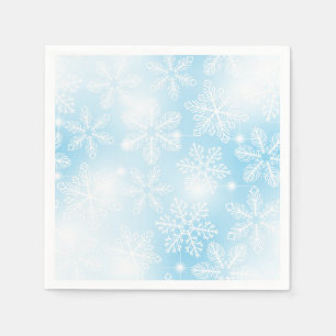 Snowflakes and lights on blue napkin