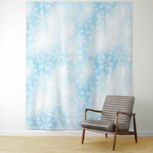 Snowflakes and lights on blue tapestry