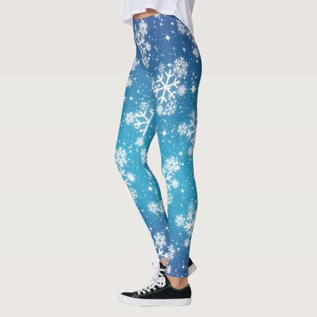 Snowflakes and Stars on Pale Blue Gradient Leggings (Left)