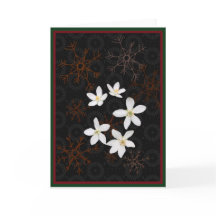 Snowflakes and white Christmas flowers
