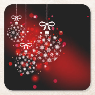 Snowflakes on a red and black background. square paper coaster