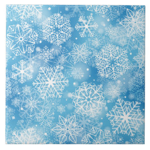 Snowflakes on blue ceramic tile