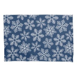 Snowflakes on dark blue pillowcase