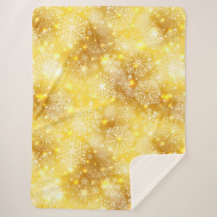 Snowflakes on golden sherpa blanket