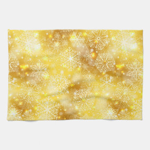 Snowflakes on golden tea towel