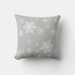 snowflakes on grey cushion