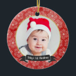 Snowflakes on Red 1st Christmas Photo Ornament<br><div class="desc">Delicate white snowflakes over a red background.  Circle photo in the middle framed in gold.  Easy to customise to create a special keepsake of Baby's 1st Christmas!  Please replace the template photo prior to purchasing.</div>