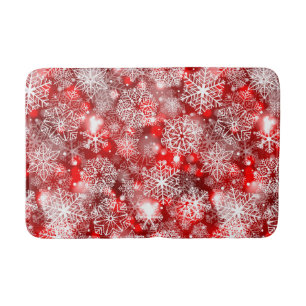 Snowflakes on red bath mat
