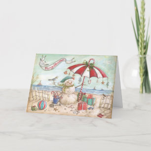 Snowman at the beach holiday card