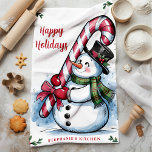 Snowman Candy Cane Happy Holidays Christmas Tea Towel<br><div class="desc">Bring holiday cheer to your kitchen with this adorable personalised Christmas kitchen towel featuring a festive snowman holding a large candy cane wrapped in a red bow. With holly accents and "Happy Holidays" greeting, this towel adds a joyful touch to your holiday baking and decorating. Customise with your name or...</div>