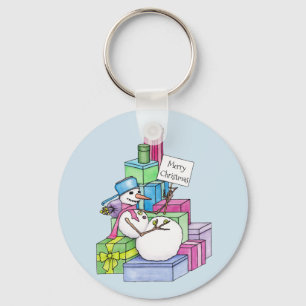 Snowman chilling on presents key ring