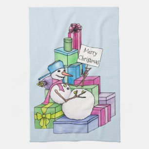 Snowman chilling on presents tea towel