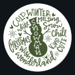 Snowman Christmas Winter Wonderland typography Classic Round Sticker<br><div class="desc">A festive typography composition of handwritten Christmas quote (Snow Chill, Jingle Bells, Cold Winter , White Christmas, Wonderland, Christmas Wish) encircles a doodle snowman with little hearts and snowflakes. Perfect to seal you Christmas and Holidays letters and Holiday cards or to adorn your Presents under the Christmas tree! Forest Green...</div>