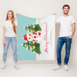 Snowman Illustration Custom Family Name Christmas Fleece Blanket<br><div class="desc">Destei's cartoon illustration of a festive snowman. The snowman is wearing a red hat and a scarf that has red and white stripes on it. His nose is made of an orange carrot while his arms are made of brown sticks. Behind the snowman are two fir trees with some snow...</div>