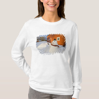 Snowman in front of red barn in Columbia Falls T-Shirt