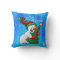 Snowman pillow hugging a Christmas tree