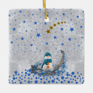 Snowman with sparkly blue stars ceramic ornament