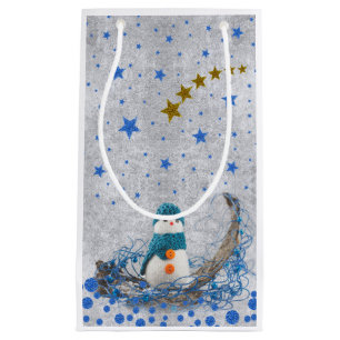 Snowman with sparkly blue stars on abstract silver small gift bag