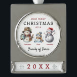 Snowmen Family of Three First Christmas Silver Plated Banner Ornament<br><div class="desc">Snowman Family of Three First Christmas Ornament for parents who just had their first child with mum, dad and baby snowmen. Our first Christmas as a family of three personalised snowman keepsake ornament.Celebrate your first holiday season as a family with our "Our First Christmas as a Family of 3" ornament,...</div>
