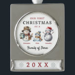 Snowmen Family of Three First Christmas Silver Plated Banner Ornament<br><div class="desc">Snowman Family of Three First Christmas Ornament for parents who just had their first child with mum, dad and baby snowmen. Our first Christmas as a family of three personalised snowman keepsake ornament.Celebrate your first holiday season as a family with our "Our First Christmas as a Family of 3" ornament,...</div>