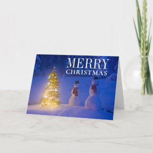 Snowmen Standing Next To Christmas Tree Holiday Card
