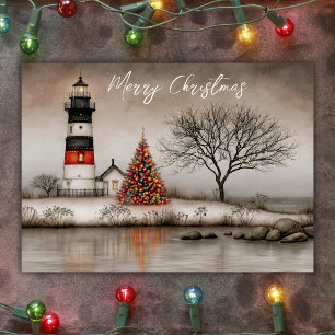 Snowy Coastal Lighthouse with Christmas Tree Holiday Card