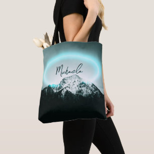 Snowy mountain mysterious blue neon light monogram tote bag