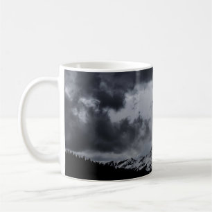 SNOWY MOUNTAIN UNDER DRAMATIC CLOUDS COFFEE MUG