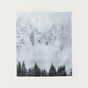 Snowy mountains and spruce forest tapestry