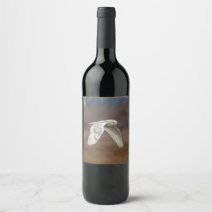 Snowy owl in flight wine label