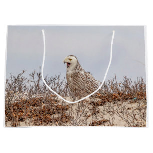 Snowy owl sitting on the beach large gift bag