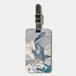 Snowy Owl taking off from snow Luggage Tag
