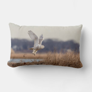 Snowy owl taking off lumbar cushion