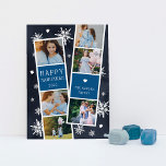 Snowy Photobooth Hanukkah Photo Collage Holiday Card<br><div class="desc">Cute Hanukkah photo card features two photo booth strips, each with three photos and a blue text panel, for a total of six photos. Personalize with the year and your family name or names in whimsical, festive white lettering, on a navy blue background dotted with hand white snowflakes and white...</div>