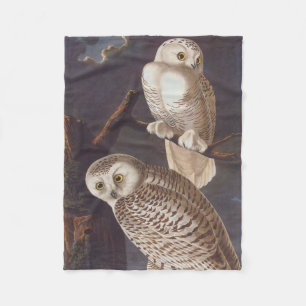 Snowy White Owls on a Dark Cloudy Night by Audubon Fleece Blanket