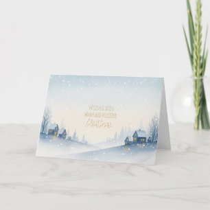 Snowy Winter Hillside Village with Warm Christmas Holiday Card