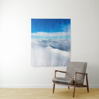 Snowy winter mountain wrapped in clouds