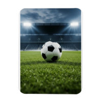 Soccer Ball on Grass Field Under Stadium Lights –